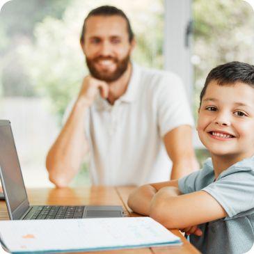 Parent supervising their child online education-student enjoying online lesson-PC-course